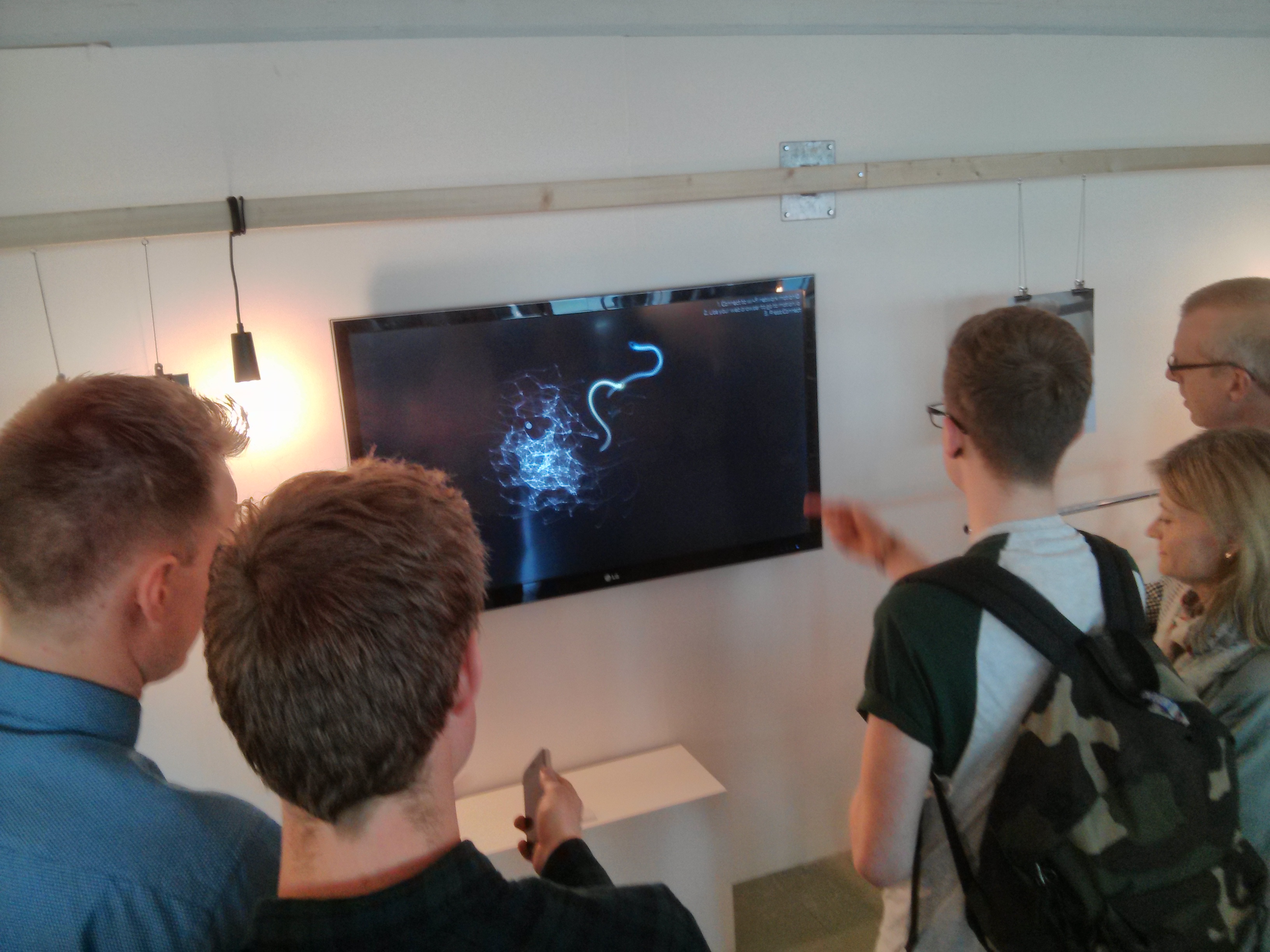 People using MotionIO at the 2014 DJCAD Degree Show opening night